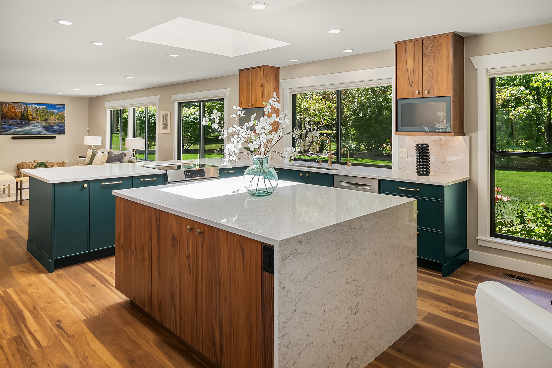 Bellevue kitchen remodel with walnut island and waterfall quartz counters