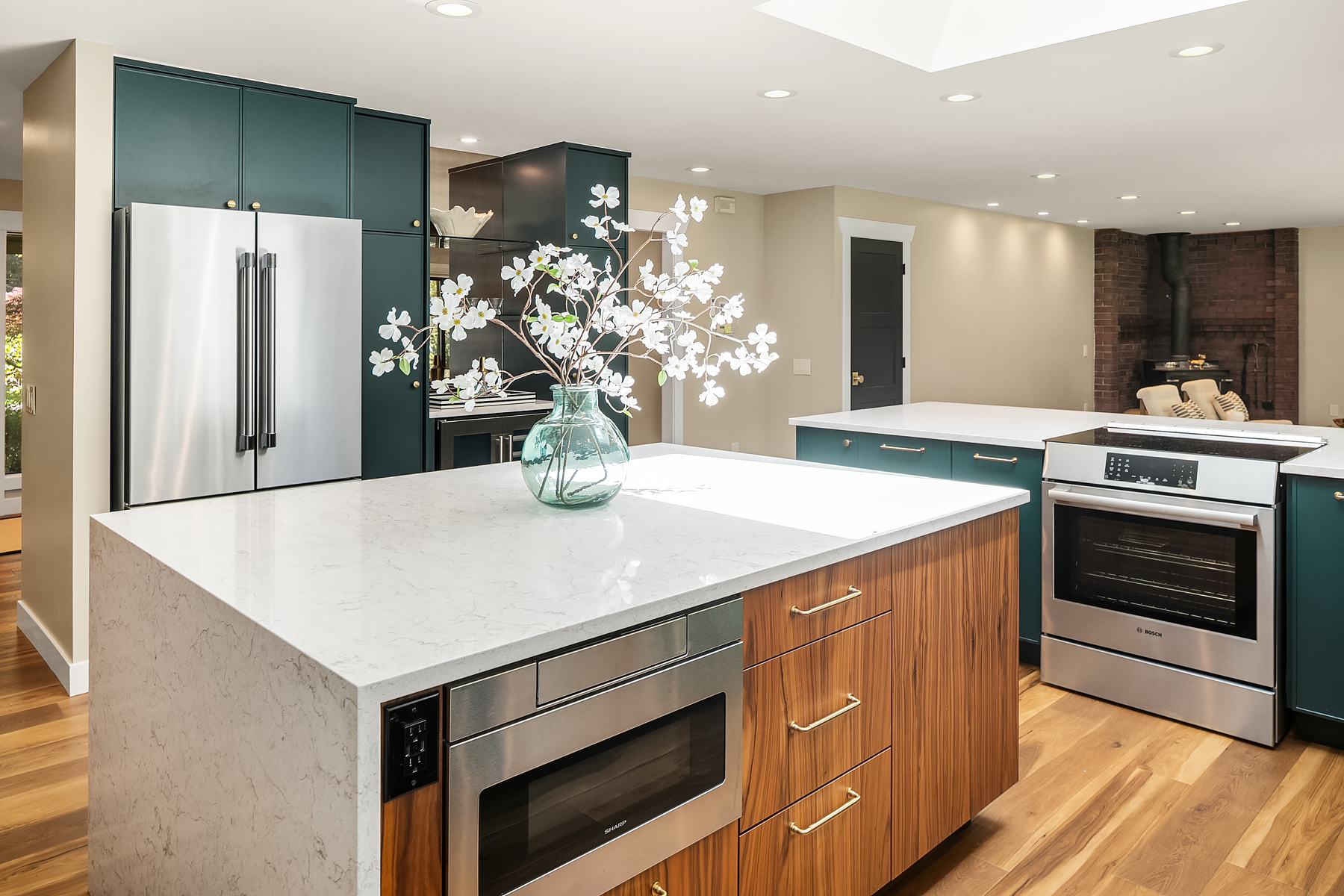Bellevue kitchen remodel with waterfall island and custom range